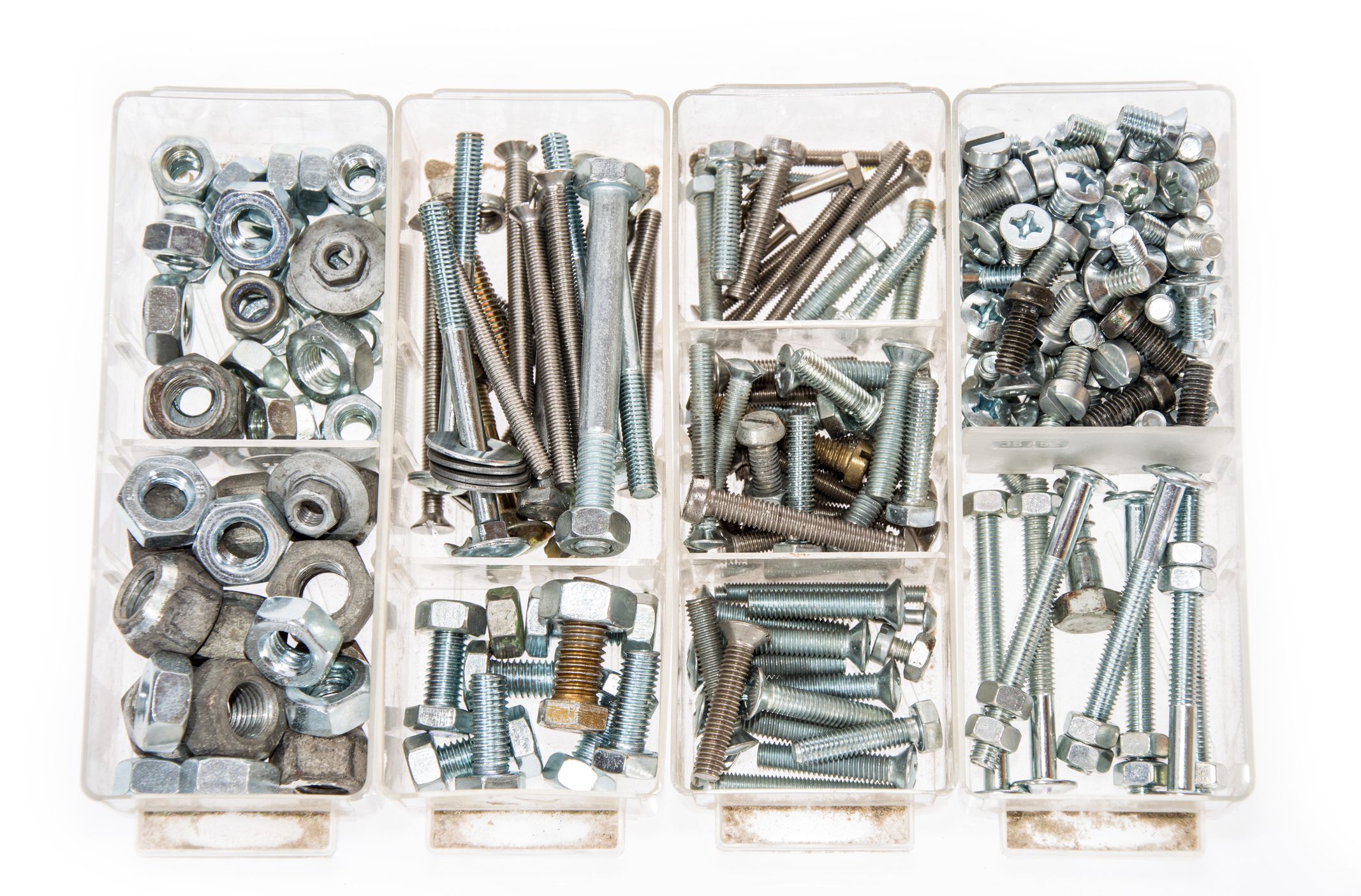 Assorted screws and nuts in plastic organizer.